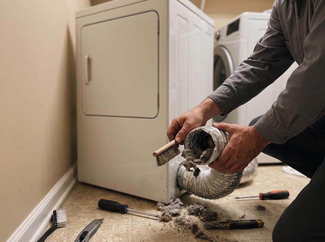 Technician working on a dryer vent installation